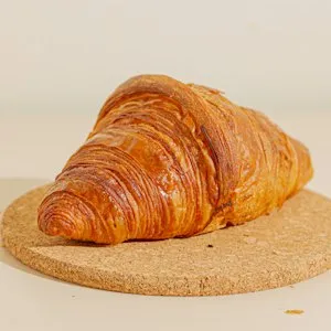Butter croissant on a café website menu